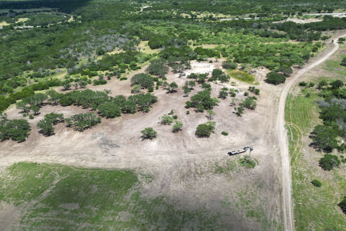 Selectively cleared Hill Country ranch with new ranch roads, aerial view